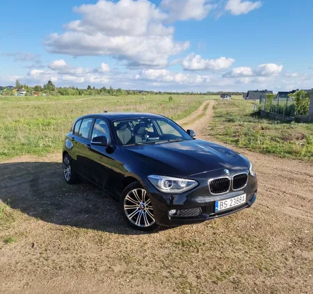 samochody osobowe BMW Seria 1 cena 32500 przebieg: 155500, rok produkcji 2011 z Suwałki